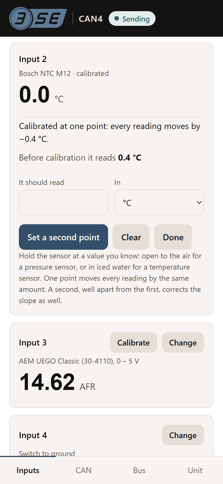 Input 2's calibration panel: calibrated at one point, every reading moves by minus 0.4 °C; before calibration it reads 0.4 °C; a field for what it should read and its unit, and the buttons Set a second point, Clear and Done.